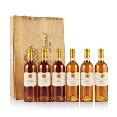 six bottles of wine in a wooden box with a wooden box