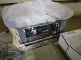 a box with a tissue on top of it on a counter