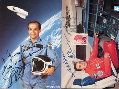 an image of a man in a space suit and a woman in a space suit