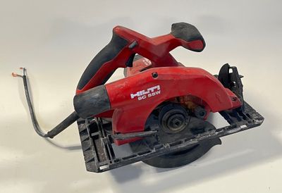a picture of a corded circular saw on a white surface