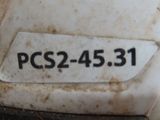 a close up of a piece of paper with a sticker that says ps2 45 31