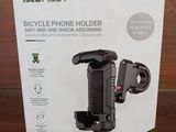 an image of a bicycle phone holder in a box on a table