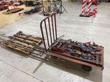 a dolly with tools on it in a warehouse