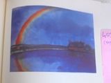 a picture of a picture of a rainbow in a book