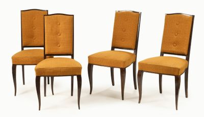 four chairs with upholstered backrests and wooden legs