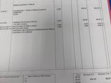 a picture of a receipt that is on top of a table