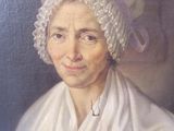 tableau représentant une vieille femme vêtue d'une robe blanche et coiffée d'un chapeau blanc