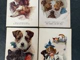 four cards with dogs and cats on them on a table