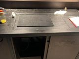 an image of a kitchen with a sink and a counter top