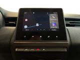 an image of a car dashboard with a touch screen and a steering wheel