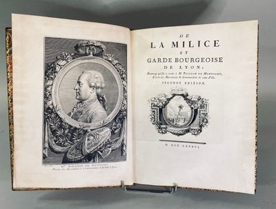 an open book with a picture of a man in a suit and tie