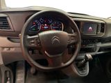 the interior of a car with a steering wheel, dashboard, and dash board