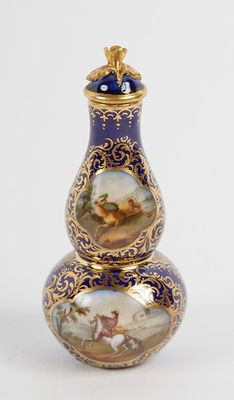 an image of a vase with a picture of a horse and rider on it