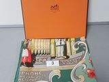 an orange box with a picture of a man and a cat on it