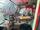 a view of the inside of a bus from the driver ' s seat