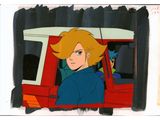 animation cel of a woman in a red car with a cat on her shoulder