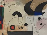 a painting of a group of people on a wall