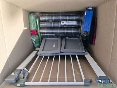 a cardboard box with a bunch of items inside of it
