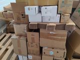 many boxes stacked on top of each other in a warehouse