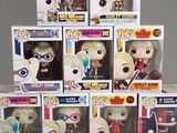 a lot of pop vinyl figures on display in the store