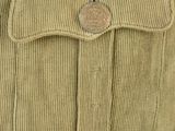 the back of a man ' s pants with a button in the pocket