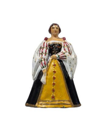 figurine of a woman in a black and white dress with a gold trim