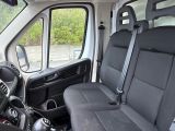 a view of the inside of a van from the driver ' s seat