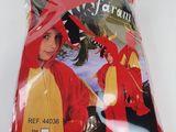 a bag of red and yellow dragon costumes on a table