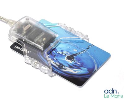 an image of a cell phone with a card attached to it