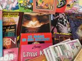 many children ' s books on the table together