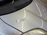 a close up of a car with a sticker on the hood