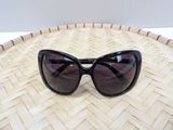 a close up of a pair of sunglasses on a basket
