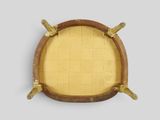 a wooden frame with a yellow cushion on top of it