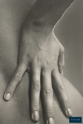 black and white photograph of a woman ' s hand on the back of her stomach