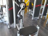 an image of a gym room with equipment in it