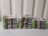 a lot of video games stacked on top of each other
