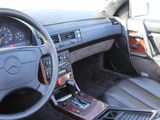 a picture of a car dashboard with a clock on it