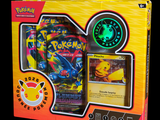 une boîte de cartes Pokémon avec un fond lumineux