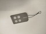 a remote that is attached to a white wall