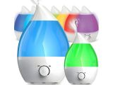 three different colors of a humider sitting next to each other on a white surface