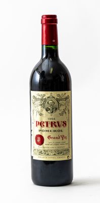 a bottle of wine that is sitting on a table