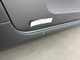a sticker on the side of a car door