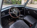 a view of the inside of a car from the driver ' s seat