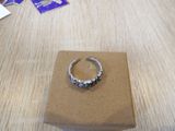 a ring sitting on top of a box on a table