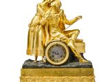 une image représentant une horloge en or sur laquelle sont assis un homme et une femme