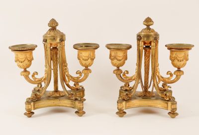 pair of french gilet candlesticks in the louis xvi style
