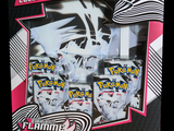 trois paquets de cartes à collectionner Pokémon dans une boîte