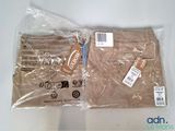two bags of clothing that are wrapped up on a table