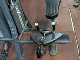 a gym equipment sitting on the floor in a gym