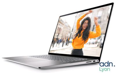 an image of a laptop with a picture of a woman on the screen